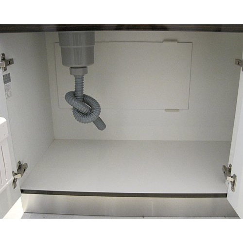 流し台内部背面に点検口があります。